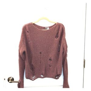Distressed knit sweater